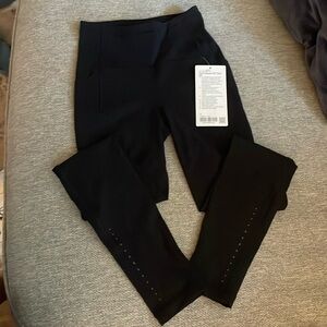 Brand new with tags. Swift speed HR tight 28”